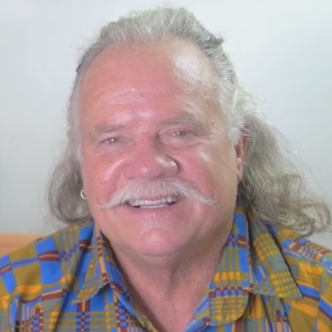 man with mustache smiling