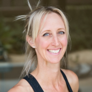 women with blonde hair smiling