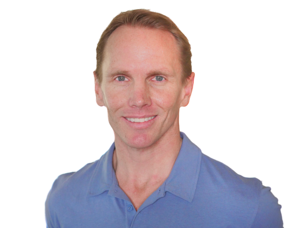 man smiling wearing blue shirt